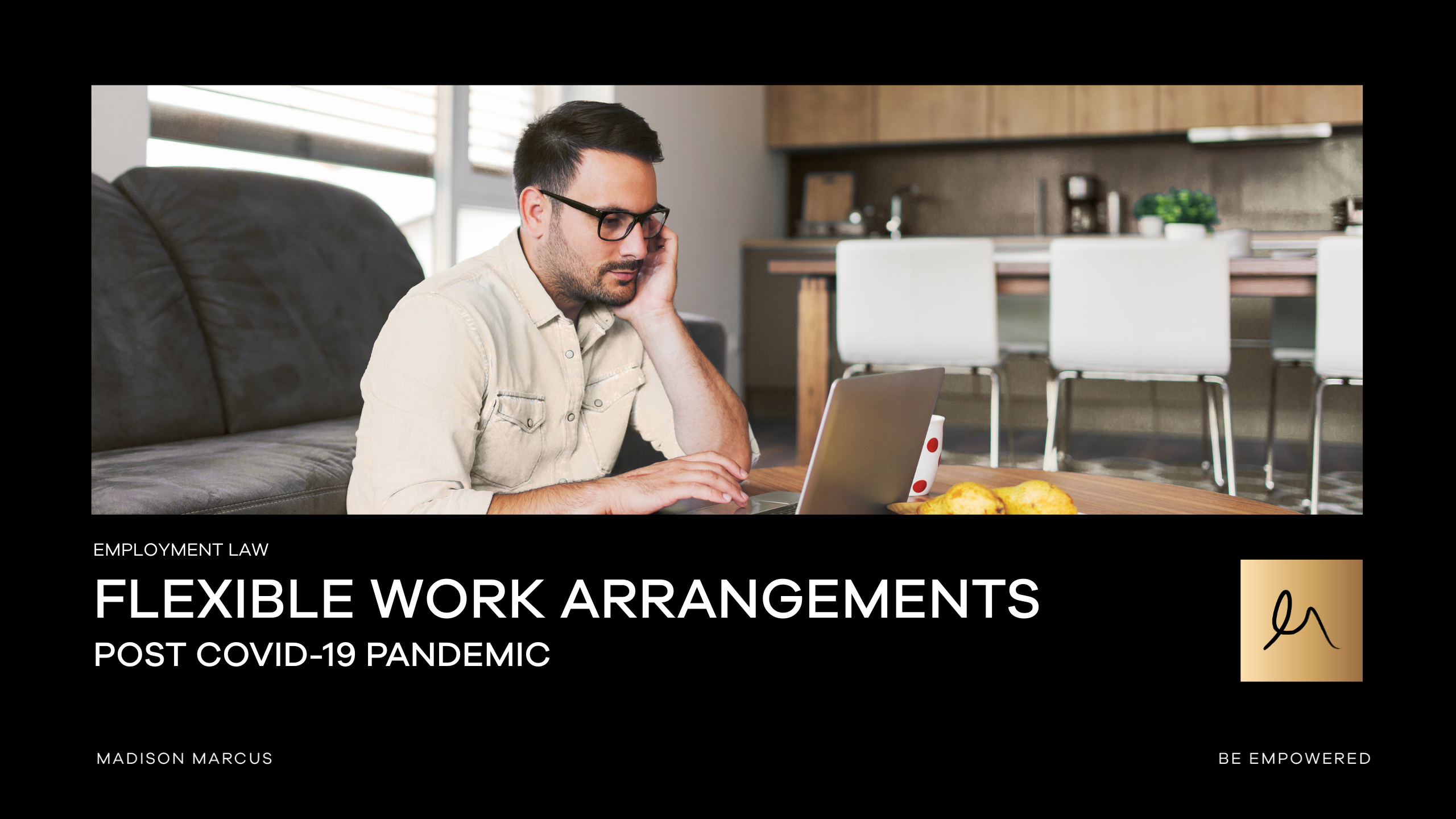 A man works remotely from his living room using a laptop, reflecting flexible work arrangements and post-COVID employment practices.