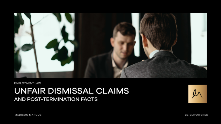 Two professionals sit across a table in a formal meeting, suggesting a termination or post-dismissal discussion in a workplace setting.
